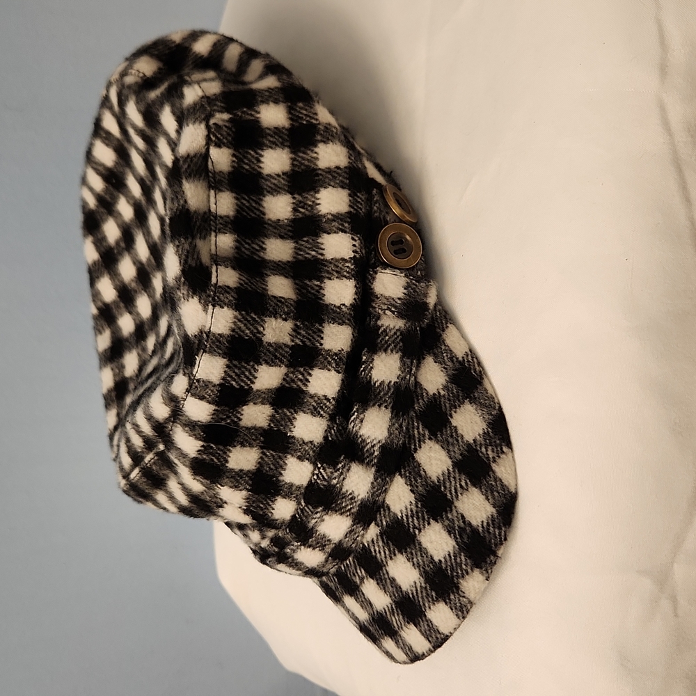 Woman's black and white checkered hat
